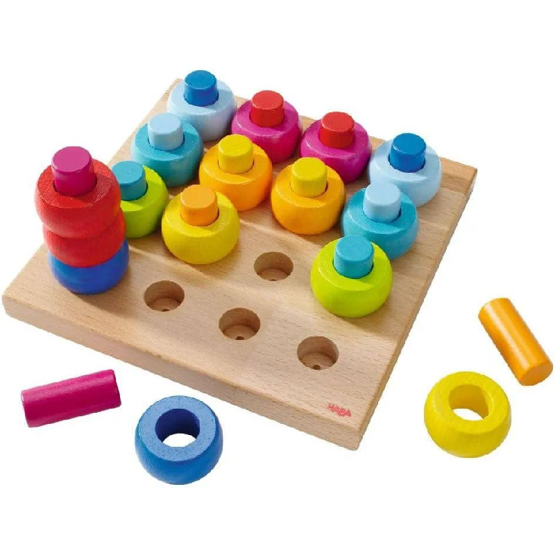 Handmade Wooden ABC Puzzle with Raised Letters for Tactile Learning ExperienceRainbow Whirls Pegs & Rings Game