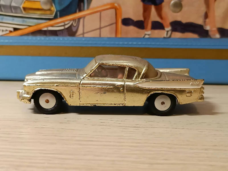 1:18 Scale Die - Cast Model of a 1969 Chevrolet Camaro SS with Opening Doors and Hood211S Studebaker Golden Hawk in silver-gold plate finish 1